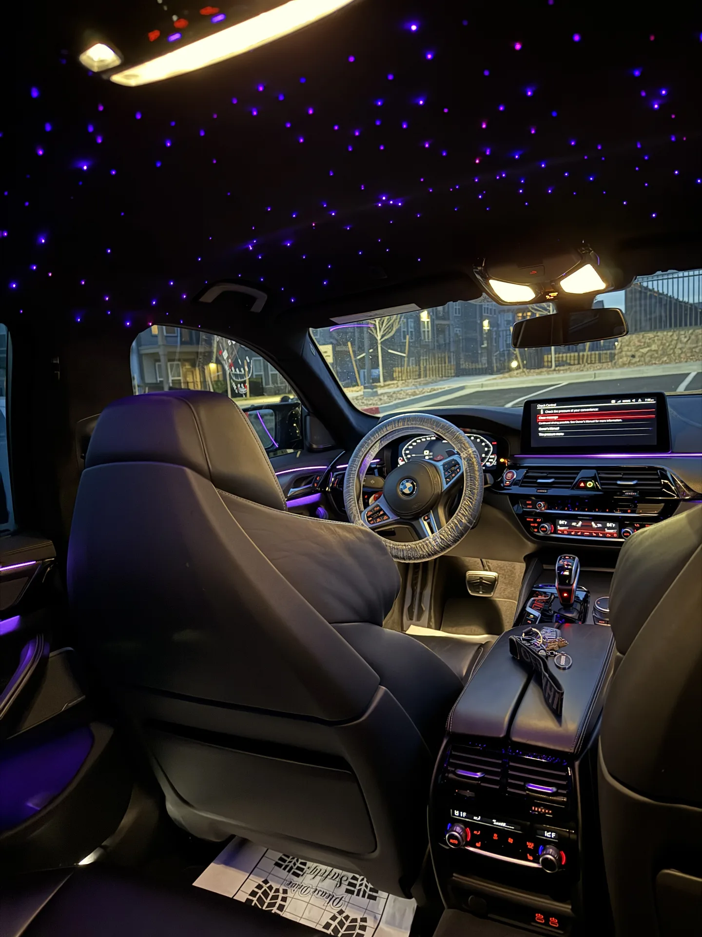 Freshly detailed car interior with clean seats, carpets and console